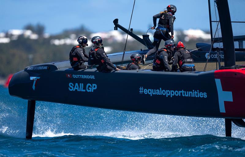 Switzerland SailGP Team helmed by Nathan Outteridge as Laurane Mettraux, grinder and strategist of Switzerland SailGP Team, crosses the boat on Race Day 1 of the Apex Group Bermuda Sail Grand Prix in Bermuda photo copyright Samo Vidic for SailGP taken at  and featuring the F50 class