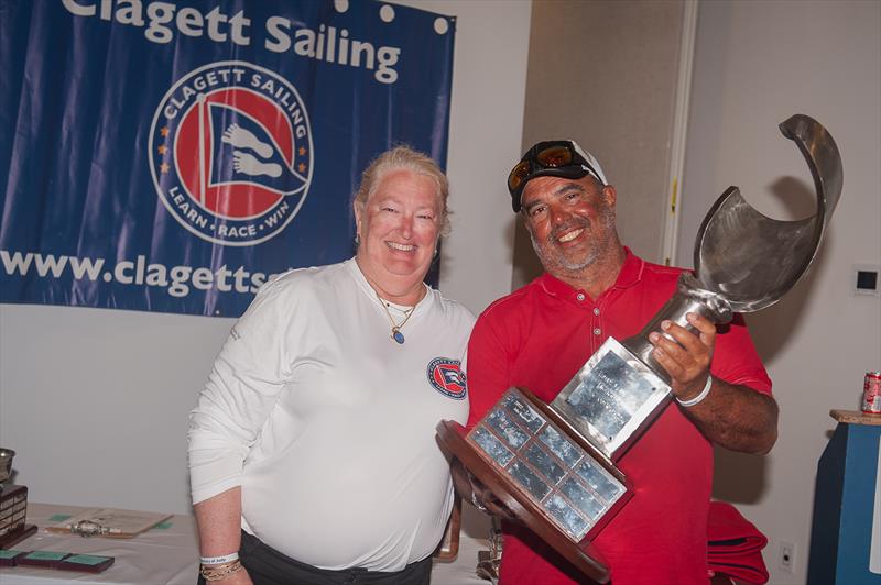 Julio Reguero winner of the C. Thomas Clagett Jr. trophy for the third consecutive time with Stephanie McLennan photo copyright Clagett Sailing - Andes Visual taken at  and featuring the 2.4m class