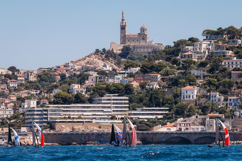 49erFX sailors practice on the bay of Marseille with the Notre-Dame de la Garde in the backdrop - photo © Sailing Energy / US Sailing Team