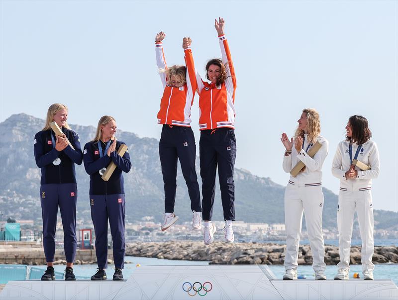 Netherlands jump for joy on the podium - Medal Race - 49erFX - Womens Skiff - Paris Olympic Sailing in Marseille, France August 2, 2024 - photo © World Sailing / Sander van der Borch