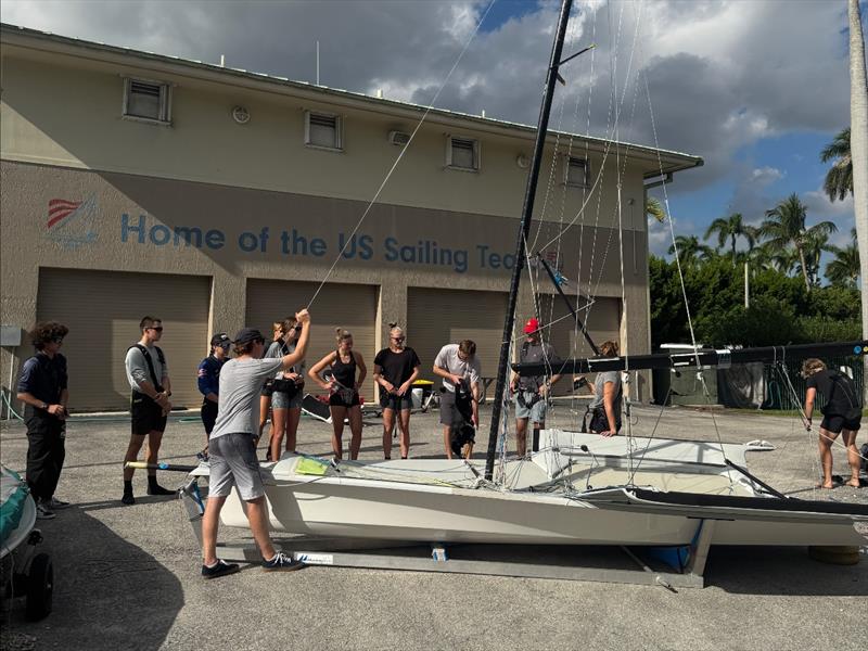 Setting up for land drills to work on footwork across the boat in the tacks, and coordination getting on and off the wire with the tiller exchange photo copyright US Sailing taken at  and featuring the 49er FX class