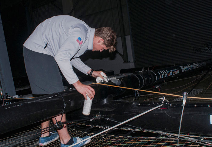 Ian and Evan maintaining the AC45s inside the Pier 80 shed photo copyright Vince Casalaina taken at  and featuring the AC45 class