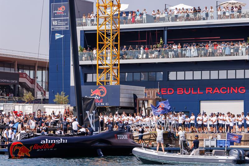 Shore team, friends and family cheer as Alinghi Red Bull Racing BoatOne docks out out ahead of racing at the Louis Vuitton Preliminary Regatta Day 2 in Barcelona, Spain - photo © Samo Vidjc