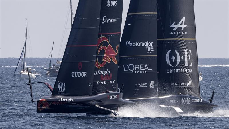 Alinghi Red Bull Racing vs. Orient Express Racing on Louis Vuitton Cup Round Robin 1 Day 1 photo copyright David Maynard / www.alleycatphotographer.com taken at  and featuring the AC75 class