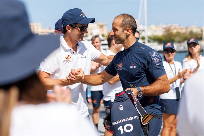 Silvio Arrivabene greats Arnaud Psarofaghis at team base after racing on day 2 at the Louis Vuitton Cup - photo © Samo Vidic