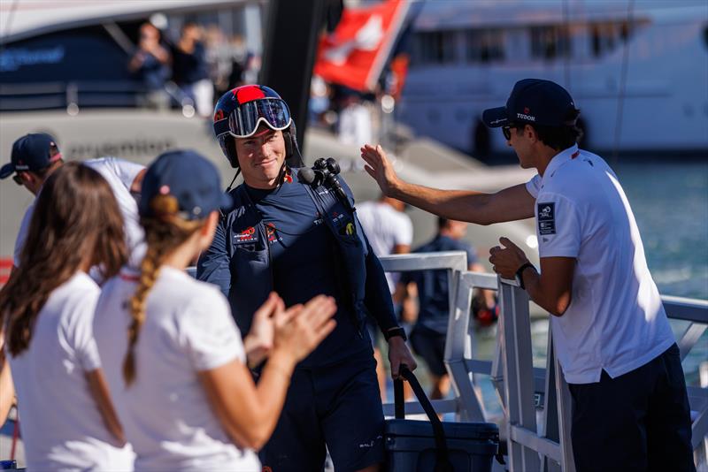 Nicolas Rolaz is greeted by Silvio Arrivabene at dock in after racing. Louis Vuitton Cup Semi Finals day 2 in Barcelona, Spain - 15th September 2024 - photo © Alinghi Red Bull Racing / Oriol Castello