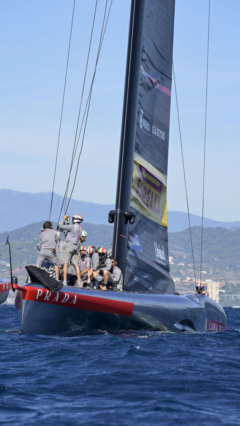 Luna Rossa Prada Pirelli change their mainsail due to broken battens on Louis Vuitton Cup Final Day 3 - September 29, 2024 photo copyright David Maynard / www.alleycatphotographer.com taken at  and featuring the AC75 class