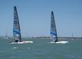 Emirates Team New Zealand's Glenn Ashby trails Blair Tuke  in the A-Class Catamaran World Championships in Hervey Bay, Queensland, Australia © Josh McCormack