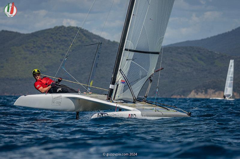 Young German ace Mortiz Weis going well currently - A Class Cat Worlds at Punta Ala day 2 photo copyright Gordon Upton / www.guppypix.com taken at Centro Velico Punta Ala and featuring the A Class Catamaran class