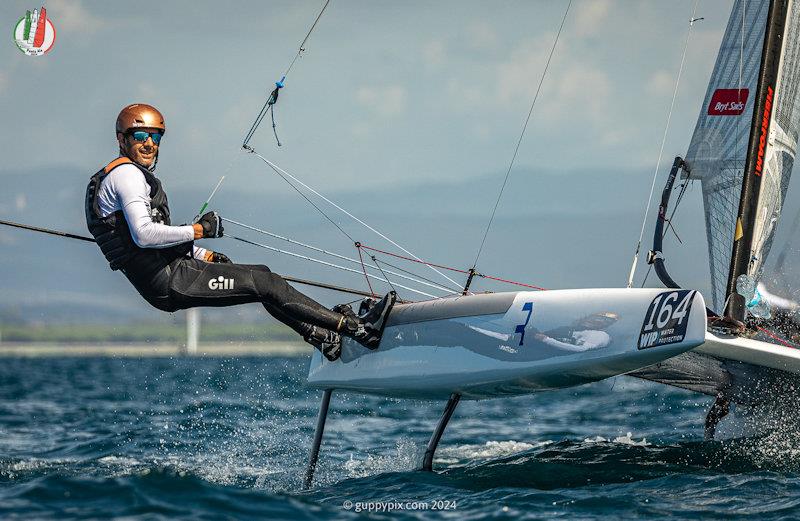 Kiwi Champ Dave Shaw going well despite a damaged main foil - A Class Cat Worlds at Punta Ala day 2 photo copyright Gordon Upton / www.guppypix.com taken at Centro Velico Punta Ala and featuring the A Class Catamaran class