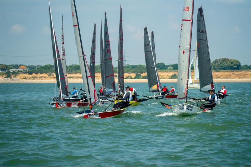 Blazes sailing during Blaze National Championship 2023 photo copyright Petru Balau Sports Photography / sports.hub47.com taken at Warsash Sailing Club and featuring the Blaze class