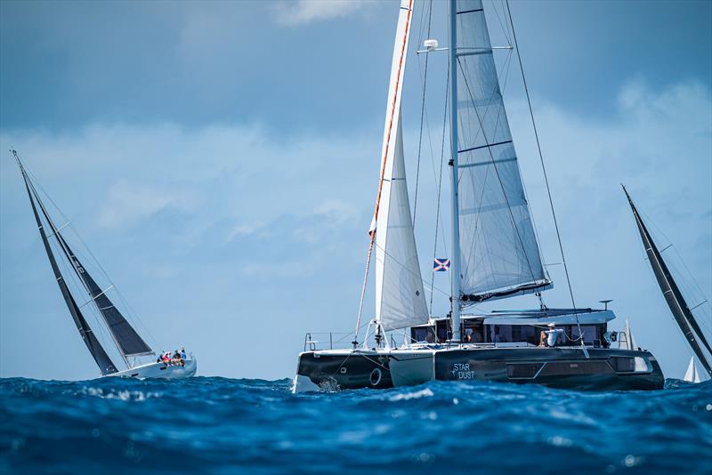 Catamarans can be racers (or cruisers) too! The St. Maarten Heineken Regatta offers several multihull racing classes based on rating and vessel performance capabilities photo copyright Laurens Morel / www.saltycolours.com taken at Sint Maarten Yacht Club and featuring the Catamaran class