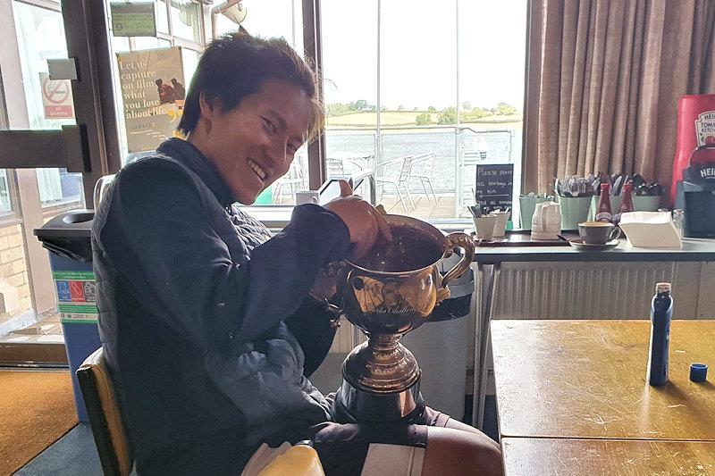 Chi Chian Wu polishing the trophy - UK Challenger Championships at Rutland photo copyright Graham Hall taken at Rutland Sailing Club and featuring the Challenger class