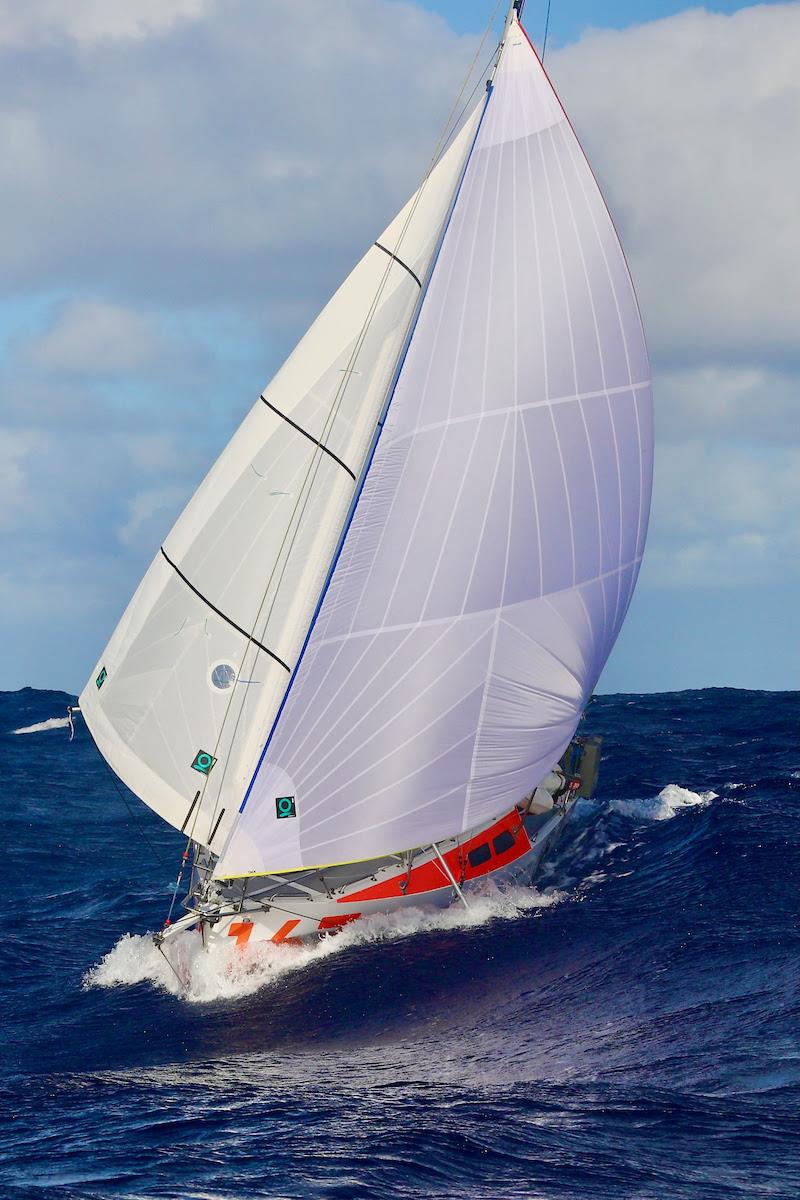 Niels Kamphuis (#163 Biggest Monkey) running hard in the sun with the A7 and jib poled out in the strong tradewinds. He had already broken one spinnaker pole in a high speed knockdown, hitting the water some days before photo copyright World’s Toughest Row / MGR2025 taken at  and featuring the Class Mini 5.80 class