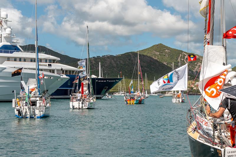 Alma Globe 580 “Sails Past” the Mega Yachts in Falmouth Marina: Fog horns from all boats are in full swing… “See you next year!!” as the Alma Globe 580 sets off on a quick lap of the planet - photo © Rob Havill / MGR2025