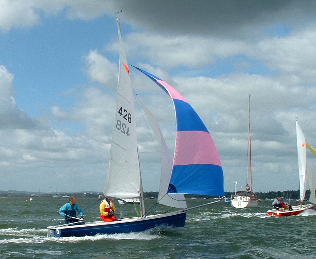 Guy Farrant and Marilynn Booker in their Comet Trio reaching at the Second King Cup Race photo copyright Bob Horlock / www.fotoboat.com taken at Exe Sailing Club and featuring the Comet Trio class