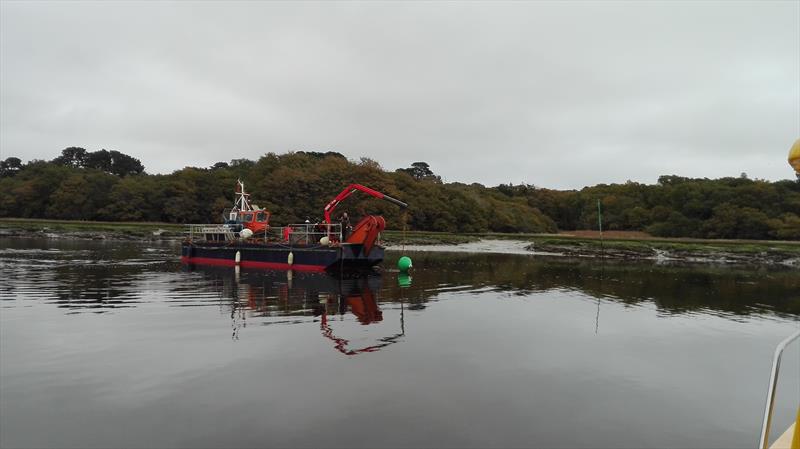 New Beaulieu River navigation mark being installed photo copyright Beaulieu taken at  and featuring the Cruising Yacht class