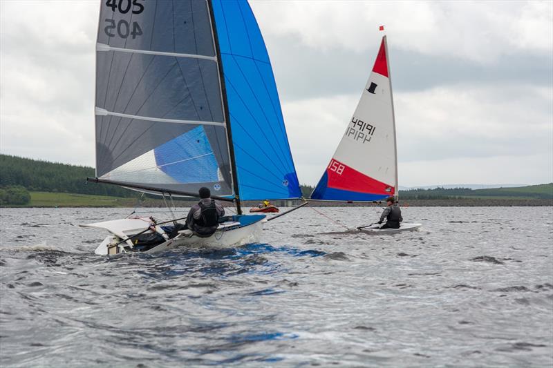 The fast and the Topper during the Border Counties Midweek Sailing Series at Llyn Brenig photo copyright Pete Chambers taken at Llyn Brenig Sailing Club and featuring the D-One class