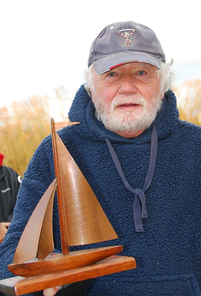 Brass Monkey Christmas race at Abbey Meads - ex-Solo sailor collecting his DF 95 trophy - photo © Roger Stollery