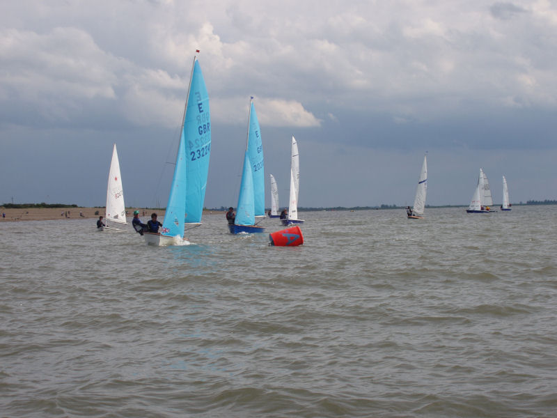 Racing during the Lionel Wilkinson Memorial Regatta photo copyright Tim Coleman taken at Snettisham Beach Sailing Club and featuring the Dinghy class