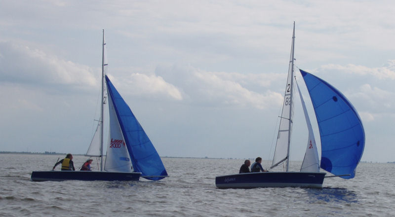 Racing during the Lionel Wilkinson Memorial Regatta photo copyright Tim Coleman taken at Snettisham Beach Sailing Club and featuring the Dinghy class