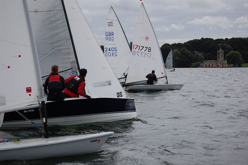 Competitors approach the start line in view of Rutland’s iconic Normanton Church at the Police Sport UK Laser and Dinghy nationals photo copyright Nicola Tyley taken at Rutland Sailing Club and featuring the Dinghy class