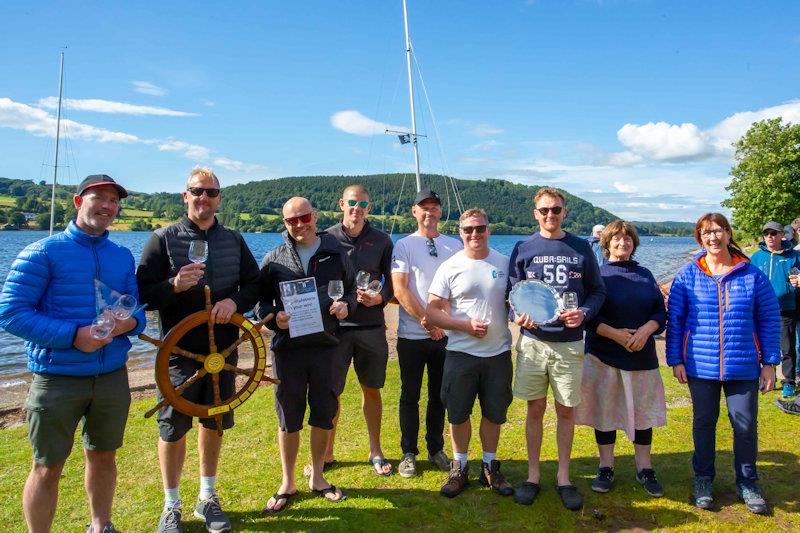 Podium places - 62nd Lord Birkett Memorial Trophy photo copyright Tim Olin / www.olinphoto.co.uk taken at Ullswater Yacht Club and featuring the Dinghy class