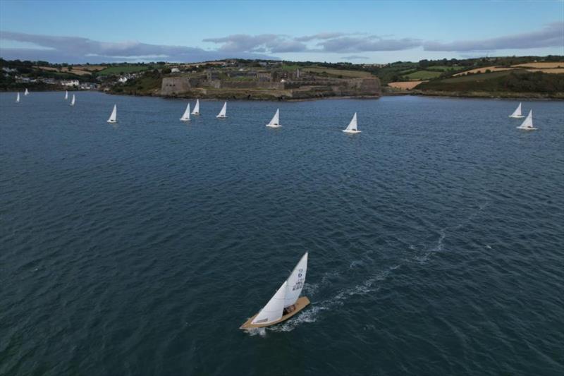 The fleet returns home past the historic Charles Fort at the end of race 3 of the Kinsale Dragon Gold Cup 2024 supported by Astra Construction Services Ltd photo copyright Jakub Walutek Photography taken at Kinsale Yacht Club and featuring the Dragon class