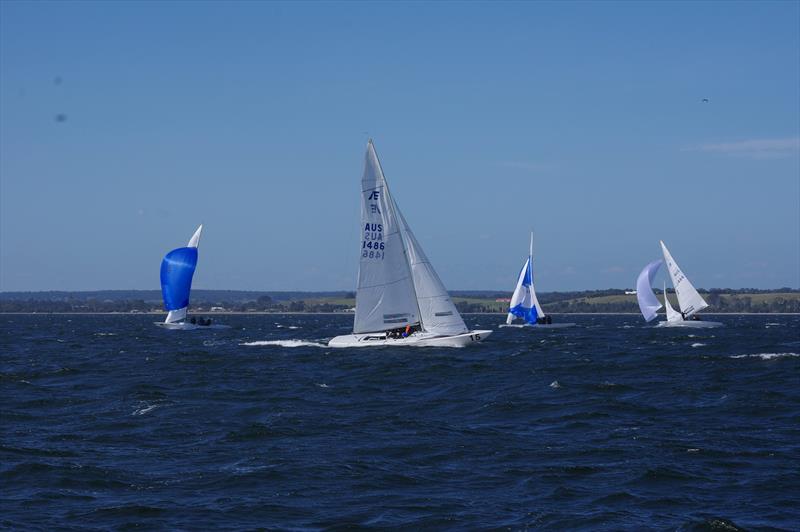 Magpie leads the fleet around the leeward mark in race three, favouring the port pin of the gate on day 1 of the Etchells Australian Championship - photo © Jeanette Severs