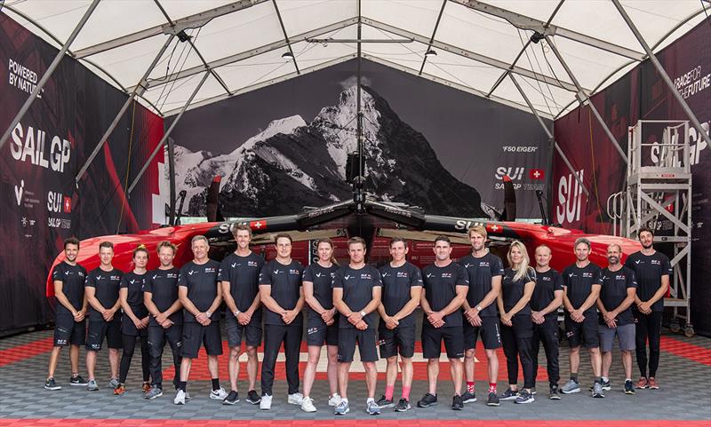 Switzerland SailGP Team pose in front of their F50 catamaran inside their team hangar at the technical area prior to racing on Race Day 2 of the Rolex United States Sail Grand Prix | Chicago at Navy Pier, Season 4, in Chicago, Illinois, USA - photo © Ricardo Pinto for SailGP