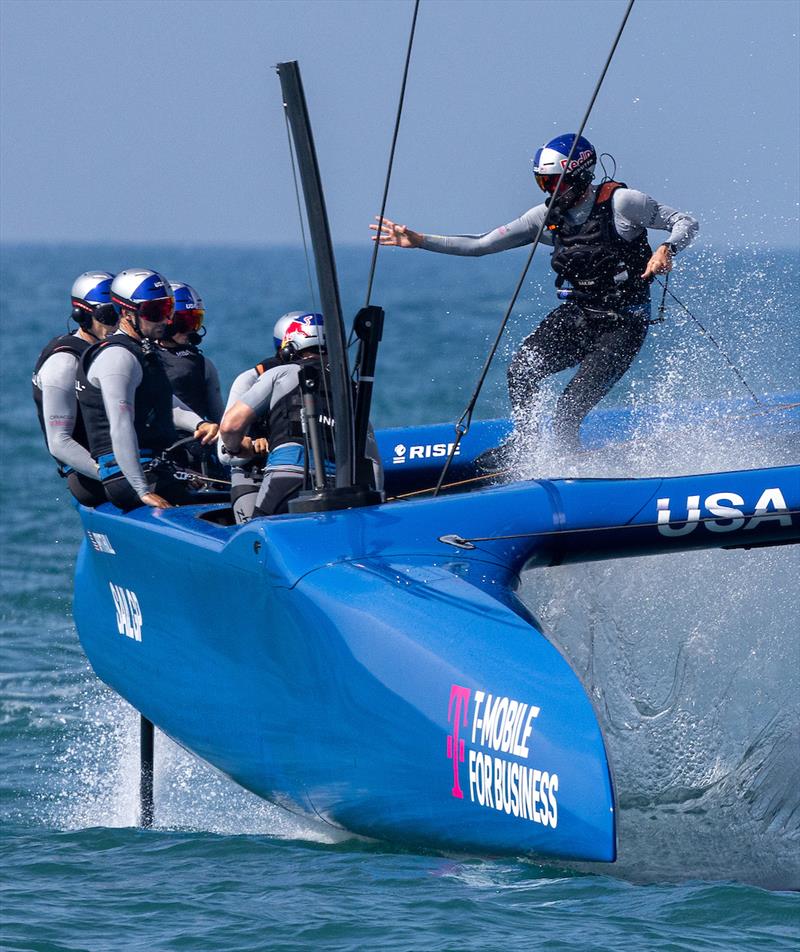 Taylor Canfield, flight controller of USA SailGP Team, runs across the boat as USA SailGP Team take part in a practice session ahead of the Spain Sail Grand Prix in Cadiz, Spain photo copyright Felix Diemer for SailGP taken at  and featuring the F50 class