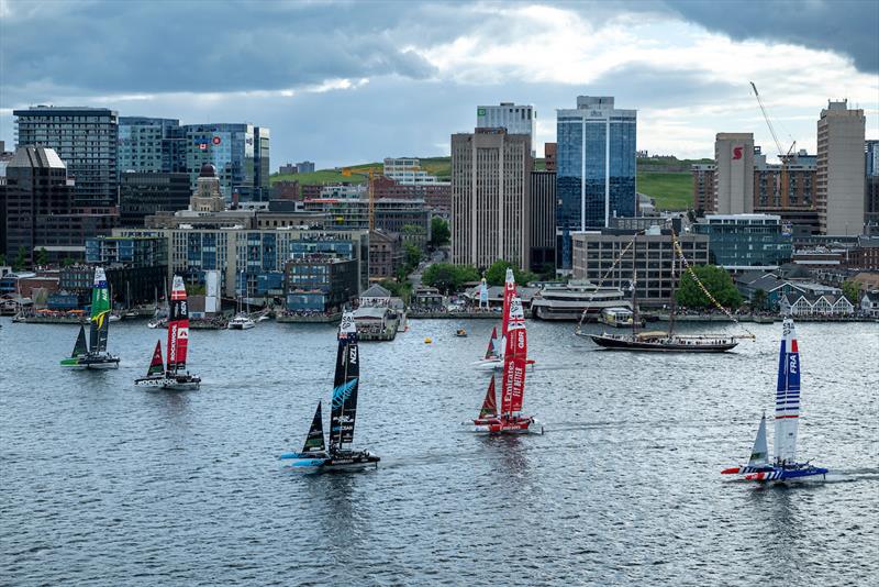 The fleet with New Zealand SailGP Team, ROCKWOOL Denmark SailGP Team and Australia SailGP Team sail past the shoreline on Race Day 1 of the ROCKWOOL Canada Sail Grand Prix in Halifax, Canada - photo © Ricardo Pinto for SailGP