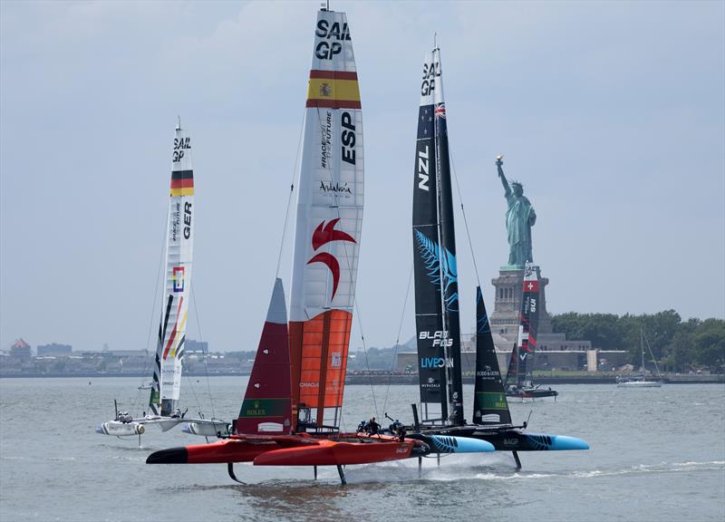 Spain SailGP Team leads New Zealand SailGP Team and Germany SailGP Team past the Statue of Liberty on Race Day 2 of the Mubadala New York Sail Grand Prix in New York, USA.  June 23, 2024 - photo © Ricardo Pinto/SailGP