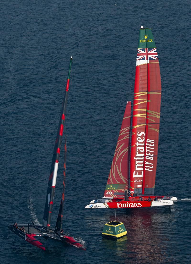 Switzerland SailGP Team helmed by Sebastien Schneiter and Emirates Great Britain SailGP Team helmed by Dylan Fletcher in action on Race Day 1 of the Emirates Dubai Sail Grand Prix presented by P&O Marinas in Dubai, UAE photo copyright Jon Buckle for SailGP taken at  and featuring the F50 class