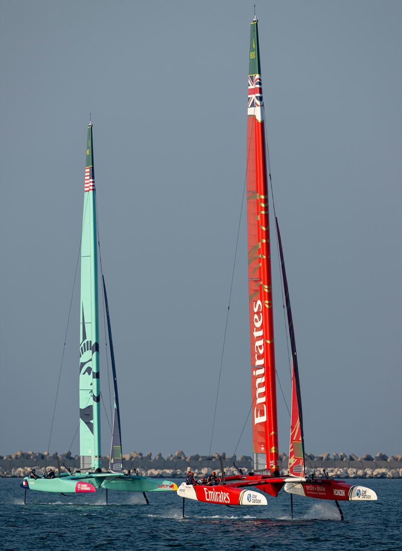 Emirates Great Britain SailGP Team helmed by Dylan Fletcher lead USA SailGP Team helmed by Taylor Canfield on Race Day 2 of the Emirates Dubai Sail Grand Prix presented by P&O Marinas in Dubai, UAE photo copyright Jon Buckle for SailGP taken at  and featuring the F50 class