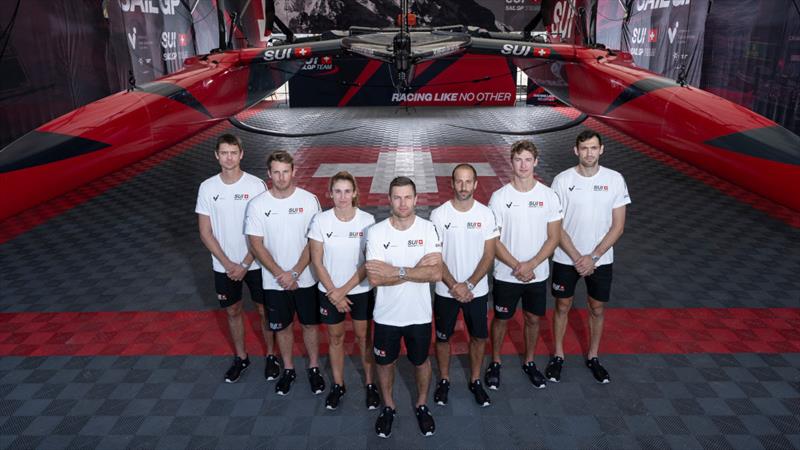 Switzerland SailGP Team photograph in the team hangar in front of the F50 catamaran ahead of the Emirates Dubai Sail Grand Prix presented by P&O Marinas in Dubai, UAE - photo © Ricardo Pinto for SailGP.