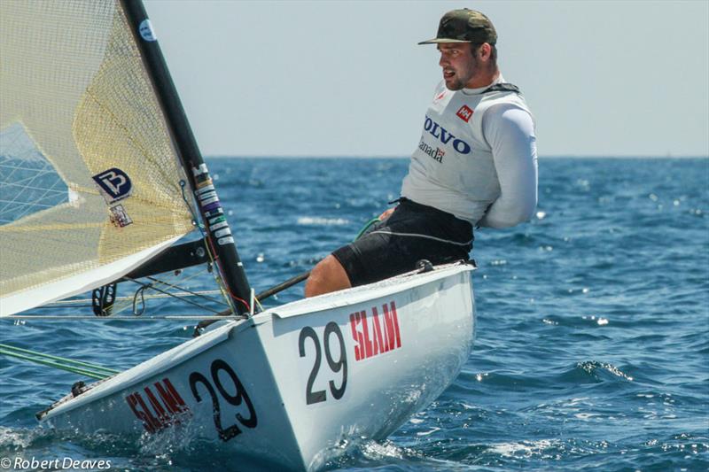 Tom Ramshaw on day 2 of the Finn Gold Cup in Gaeta photo copyright Robert Deaves taken at Yacht Club Gaeta and featuring the Finn class