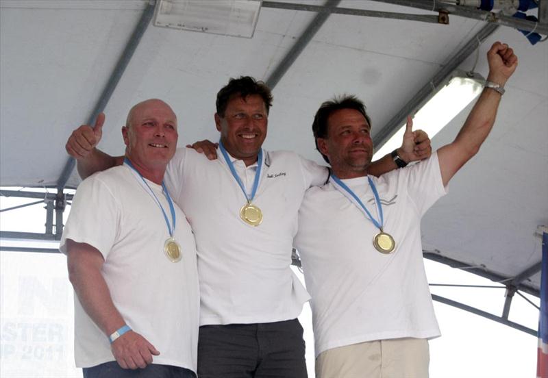 Finn World Masters podium (l to r) Allen Burrell (silver), Michael Maier (gold), Uli Breuer (bronze) photo copyright Marina Prinzivalli taken at  and featuring the Finn class