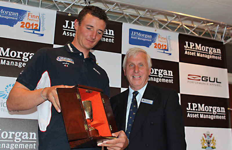 Giles Scott receives the Sunday Times Gold Cup from Peter Collett after winning the UK Finn nationals photo copyright Robert Deaves / IFA taken at Royal Cornwall Yacht Club and featuring the Finn class