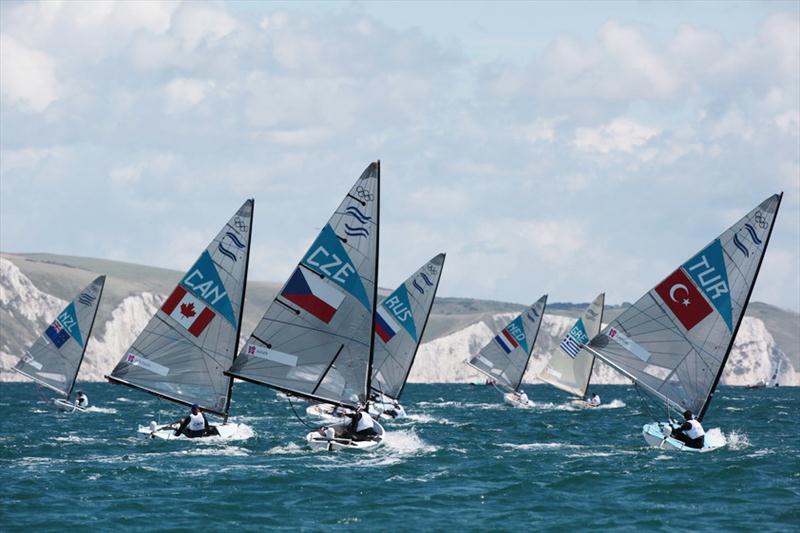 Finns on day three of the London 2012 Olympic Sailing Competition photo copyright Francois Richard taken at Weymouth & Portland Sailing Academy and featuring the Finn class