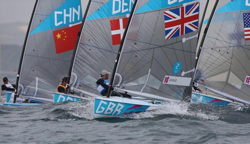 Finns on day five of the London 2012 Olympic Sailing Competition photo copyright Francois Richard taken at Weymouth & Portland Sailing Academy and featuring the Finn class