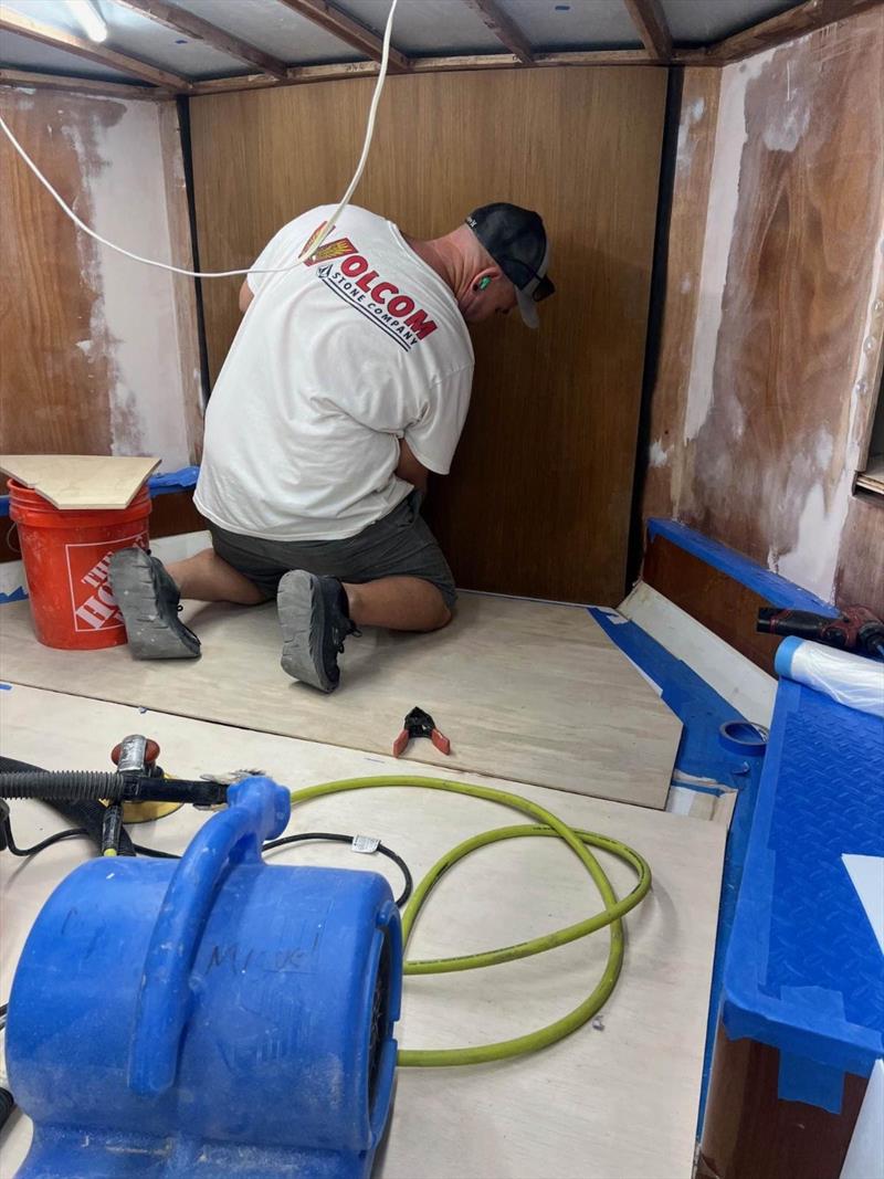 Hull #9 - Chris F on master stateroom veneer - photo © Michael Rybovich & Sons