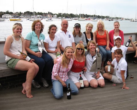 Claudia Schaefer with The Foxer Vixens celebrate the inaugural Stiletto Cup with Foxer Class Captain, John Duff on the Deck at Hamble River Sailing Club photo copyright Simon Russell taken at Hamble River Sailing Club and featuring the Foxer class