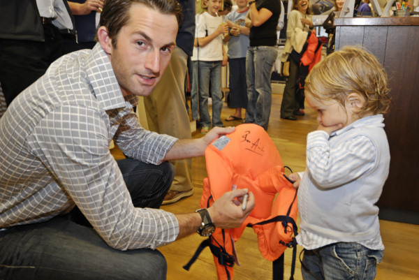 Ben Ainslie with a budding young sailor at the Lymington Henri Lloyd store photo copyright Henri Lloyd taken at  and featuring the  class