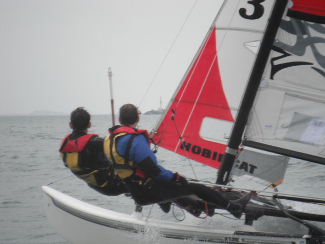 Adrian Jesson during the British Airways Round Jersey race photo copyright Elaine Burgis taken at Royal Channel Islands Yacht Club and featuring the Hobie 16 class