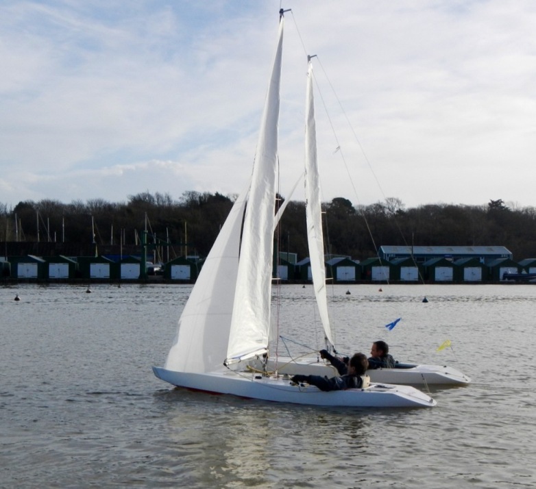 Colin Simonds and Graham Sunderland locked in battle during the Illusion Interclub Team Racing Championship photo copyright Rudy Jurg taken at Bembridge Sailing Club and featuring the Illusion class