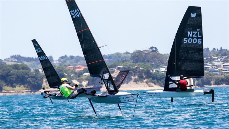 Mattias Coutts with Jake Pye (NZL5006) and Seb Menzies (NZL5065)  - Day 5 - 2024 PredictWind Moth Worlds - Manly Sailing Club. January 9, 2025 photo copyright Richard Gladwell - Sail-World.com/nz taken at Manly Sailing Club and featuring the International Moth class