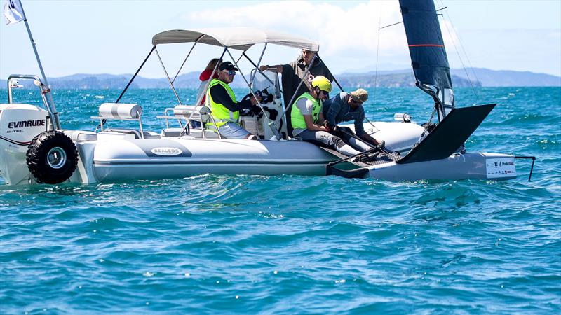 Mattias Coutts' with his support team between races  - Day 5 - 2024 PredictWind Moth Worlds - Manly Sailing Club. January 9, 2025 photo copyright Richard Gladwell - Sail-World.com/nz taken at Manly Sailing Club and featuring the International Moth class