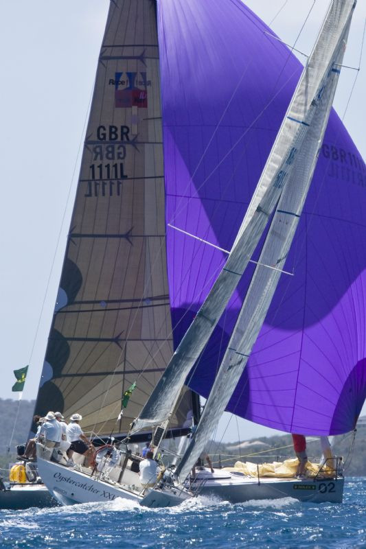 Michael Williamson's Moonraker crossing in front of Richard Matthew's Oystercatcher XXVI on the final day of the International Rolex Regatta at St. Thomas photo copyright Daniel Forster / Rolex taken at  and featuring the IRC class