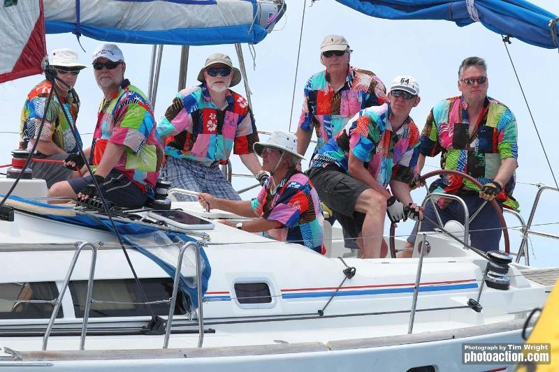 Mau Bisa 1 crew sport colourful shirts in the Bareboat fleet at Antigua Sailing Week 2013 photo copyright Tim Wright / www.photoaction.com taken at Antigua Yacht Club and featuring the IRC class